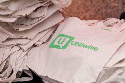 UNIwise Totebags in stack on table UNIwise Totebags in stack on table