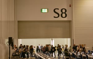 People entering laptop hall