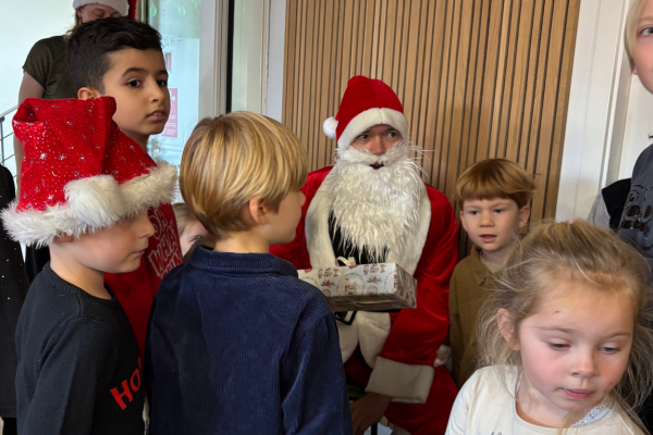 Santa visiting the UNIwise kids 2025