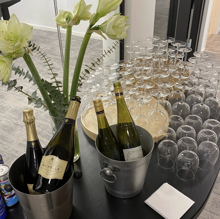 Champagne and champagne glasses at the new UNIwise offices in Aarhus