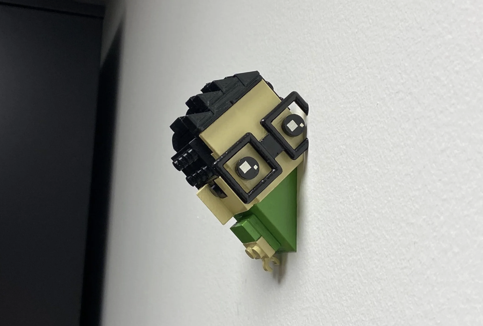 Mr. UNIwise stuck in a wall