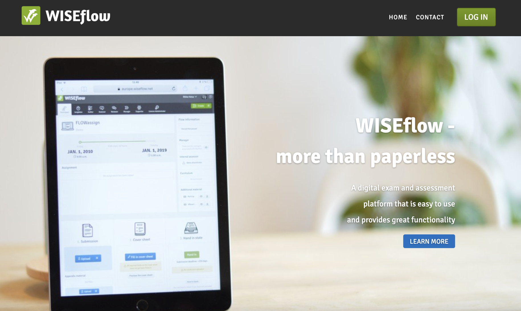 The image shows a tablet displaying a website interface for WISEflow, a digital exam and assessment platform. The tablet is on a surface with a blurred background.