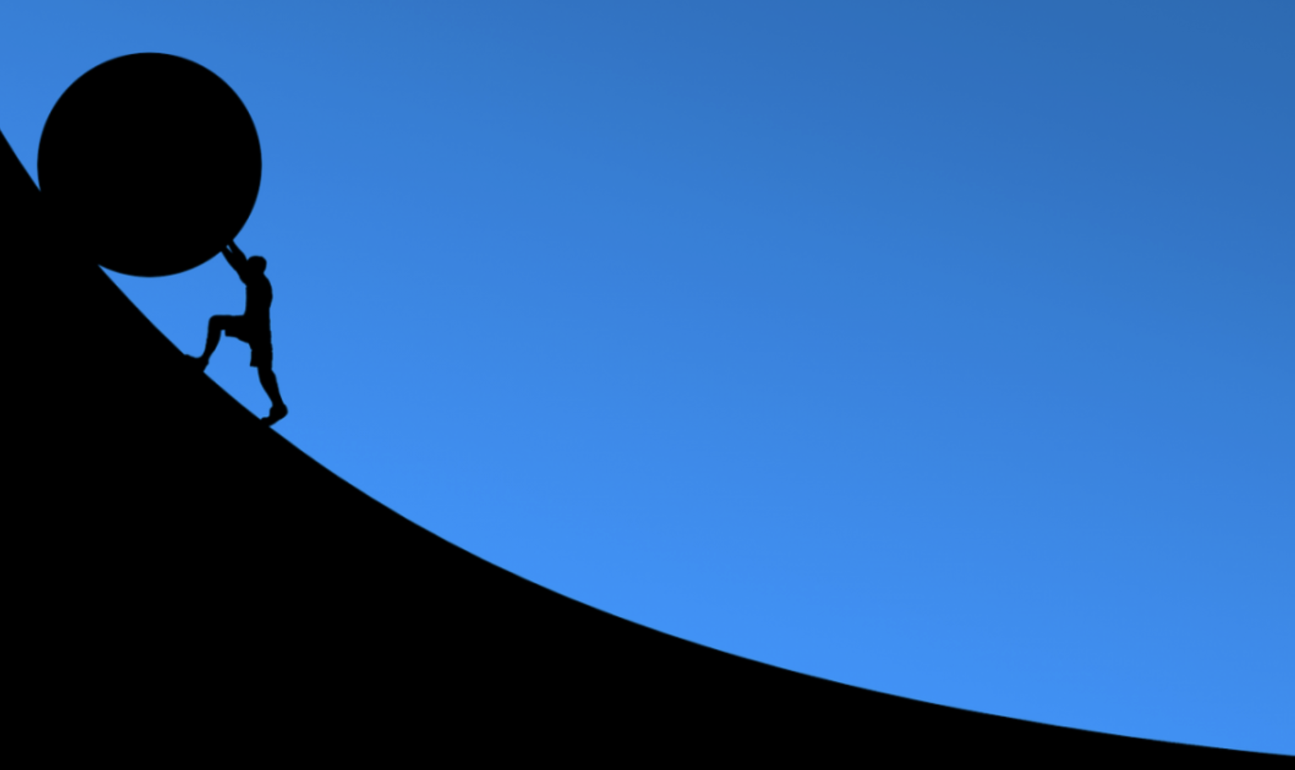 The image shows a silhouette of a person climbing up a steep, curved hill pushing a boulder like Sisyphus against a clear blue sky.